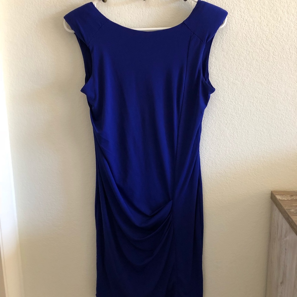 Form fitting blue dress.